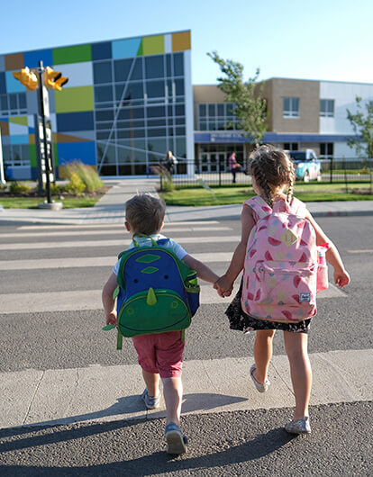 Kids walking to school near the The Orchards community Edmonton, AB